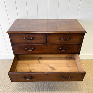 A English Georgian Chest of Drawers with Swan Neck Hardware