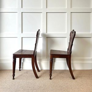 A Pair of Scottish William IV Oak Carved Hall Chairs