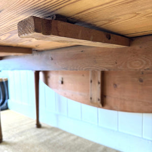 An Antique Irish Pine Oval Drop Leaf Kitchen Dining Table with Spoon Feet