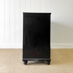 An Ebonized Antique English Chest of Drawers/Dresser