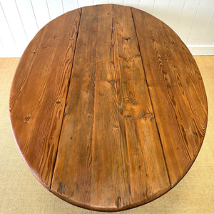 An Antique Irish Pine Oval Drop Leaf Kitchen Dining Table with Spoon Feet