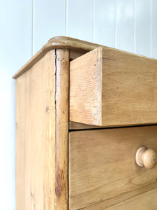 An Antique English Pine Chest of Drawers or Dresser with Tulip Feet c1890