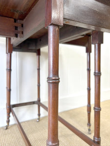 An Antique Regency Mahogany Spider Leg Table