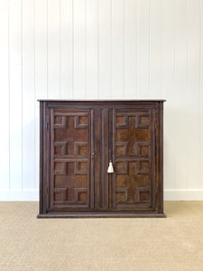 An Antique English William III Oak Clothes Cupboard