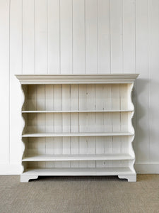 An Antique English Waterfall Bookcase in Cream