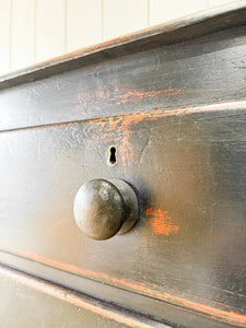 An Ebonized Antique English Chest of Drawers/Dresser