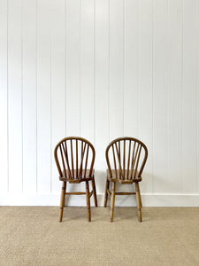 A Pair of Stick Back Elm Windsor Chairs with Natural Finish