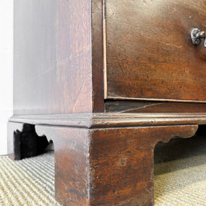 A English Georgian Chest of Drawers with Swan Neck Hardware