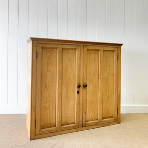 An Antique English Pine Pantry Cupboard