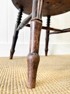 An Antique Penny-seat Stick Back Arm Chair