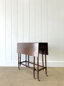 An Antique Regency Mahogany Spider Leg Table