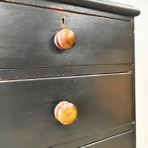 An Ebonized Antique English Chest of Drawers/Dresser