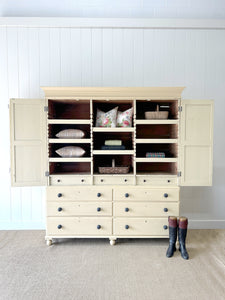 A Very Large and Useful English Pine Painted Housekeepers Cupboard