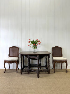 An Antique English Country Oak Drop Leaf Gate Leg Table