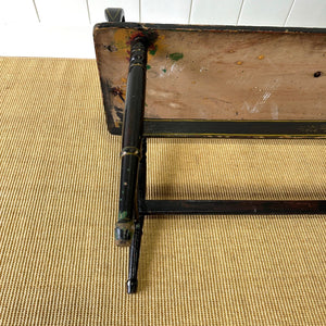 An Antique Ebonized Bench