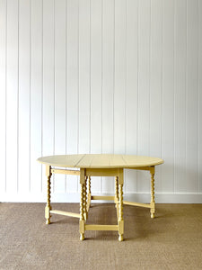 A Sunny Yellow Antique English Oak Country Drop Leaf Gate Leg Table