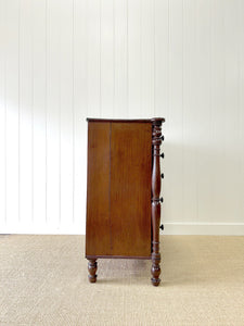 A Large Antique English Bow Front Mahogany Chest of Drawers