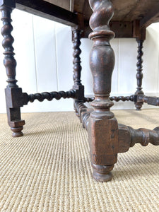 An Antique English Country Oak Drop Leaf Gate Leg Table