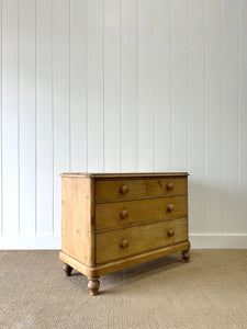 An Antique English Pine Chest of Drawers or Dresser with Tulip Feet c1890