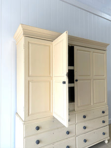 A Very Large and Useful English Pine Painted Housekeepers Cupboard