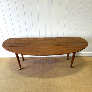 An Antique Irish Pine Oval Drop Leaf Kitchen Dining Table with Spoon Feet