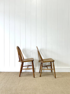 A Pair of Stick Back Elm Windsor Chairs with Natural Finish