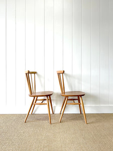 A Set of 4 Ercol Stick Back or Windsor Chairs