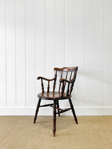 An Antique Penny-seat Stick Back Arm Chair