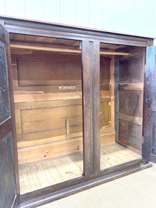 An Antique English William III Oak Clothes Cupboard