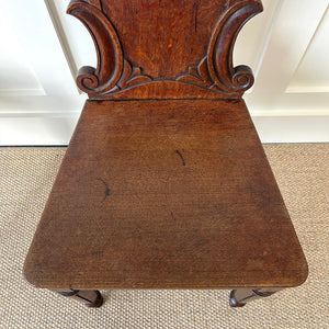 A Pair of Scottish William IV Oak Carved Hall Chairs