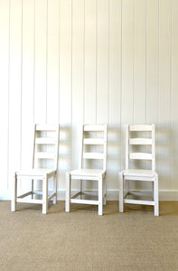 A Set of 6 Ladderback Chairs Painted White