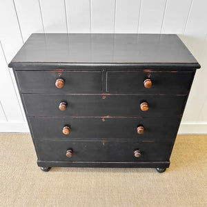 An Ebonized Antique English Chest of Drawers/Dresser