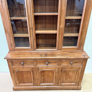 A 19th Century English Pine Bookcase Cabinet or Hutch with Arched Doors