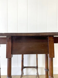 An Antique Regency Mahogany Spider Leg Table