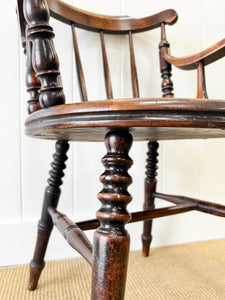 An Antique Penny-seat Stick Back Arm Chair