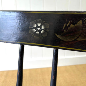 An Antique Ebonized Bench