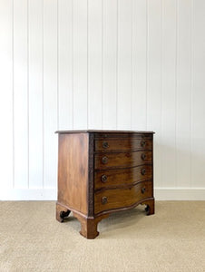 A Unique Serpentine Front Antique Mahogany Chest of Drawers