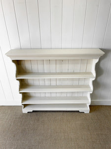 An Antique English Waterfall Bookcase in Cream