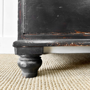 An Ebonized Antique English Chest of Drawers/Dresser