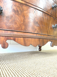 A Large Antique English Bow Front Mahogany Chest of Drawers