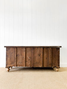 An Antique English Pine Sideboard