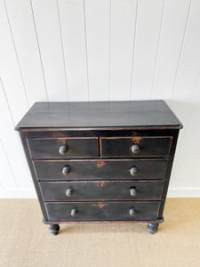 An Ebonized Antique English Chest of Drawers/Dresser