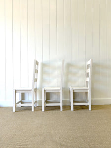 A Set of 6 Ladderback Chairs Painted White