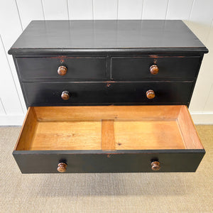 An Ebonized Antique English Chest of Drawers/Dresser