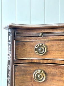 A Unique Serpentine Front Antique Mahogany Chest of Drawers