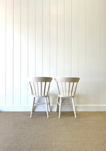 A Vintage Set of 4 White Slat Back Chairs