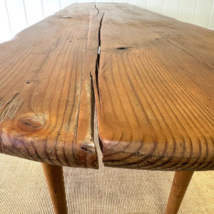 An Antique Irish Pine Oval Drop Leaf Kitchen Dining Table with Spoon Feet