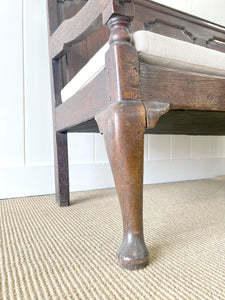 A Good 19th Century English Oak Settle with Freshly Upholstered Seat