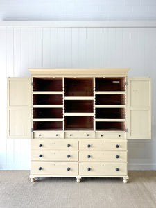 A Very Large and Useful English Pine Painted Housekeepers Cupboard