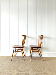 A Set of 4 Ercol Stick Back or Windsor Chairs